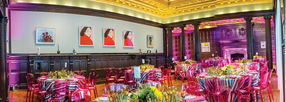 Photograph of Music Room with colorful table and chairs set up for an event