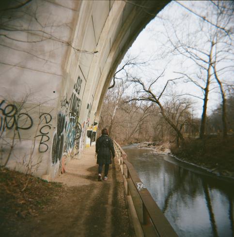 Image of a person walking ahead of the photographer 