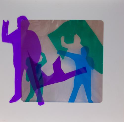 fluorescent light box with neon figurine cutouts  