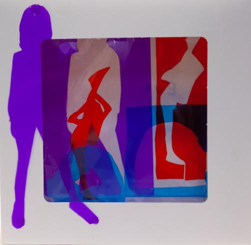 fluorescent light box with neon figurine cutouts  