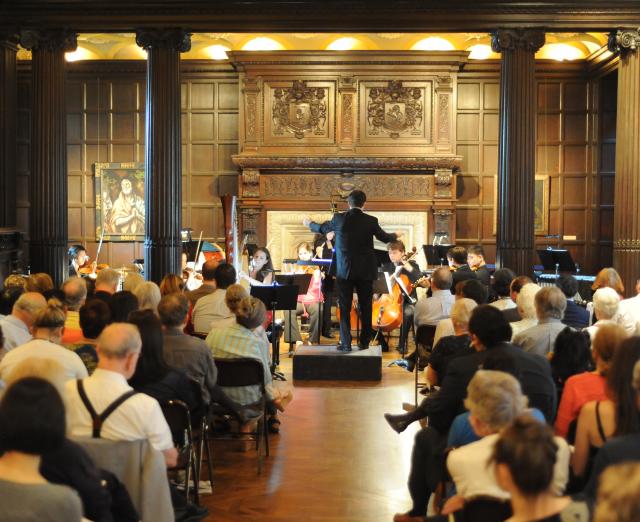 Photograph of Phillips Music Room performance with seated audience